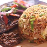 cuisine-guide_first-timers-guide-to-ghanaian-cuisine_jolof-rice_2020-10-08_308_1430-xl